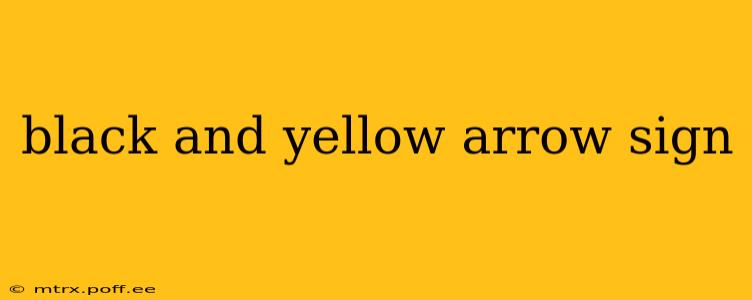 black and yellow arrow sign