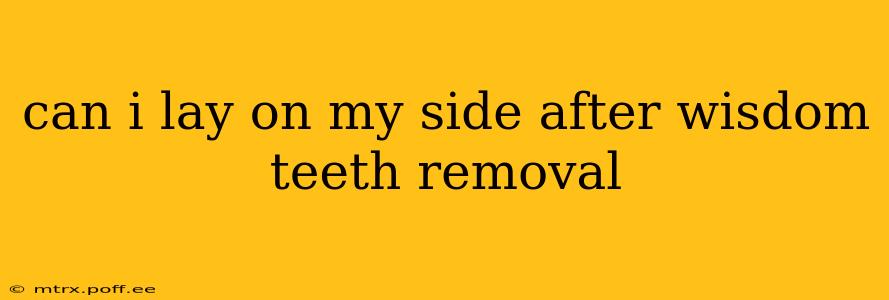 can i lay on my side after wisdom teeth removal