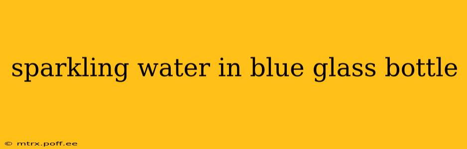 sparkling water in blue glass bottle